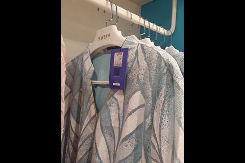 Shein dresses on rail